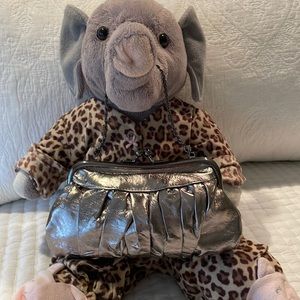 VINTAGE. Small bag- PEWTER color. Good day or night.